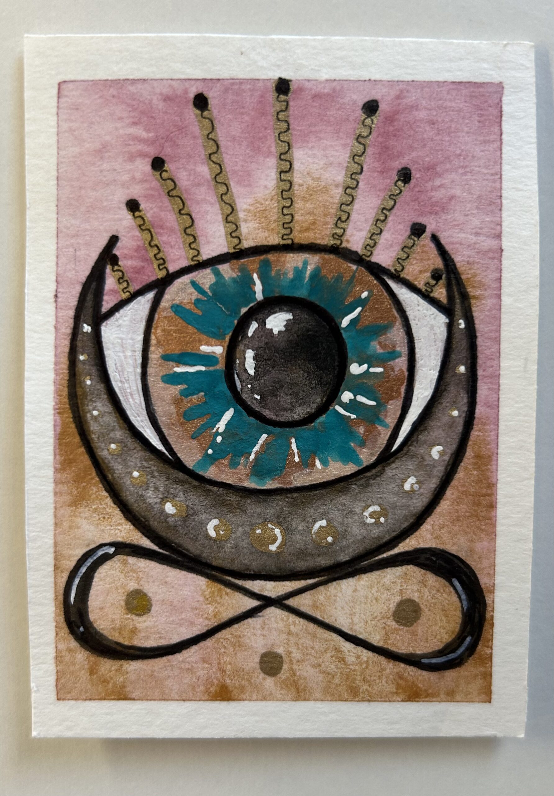 Wide opened eye with crescent moon and infinity symbol.